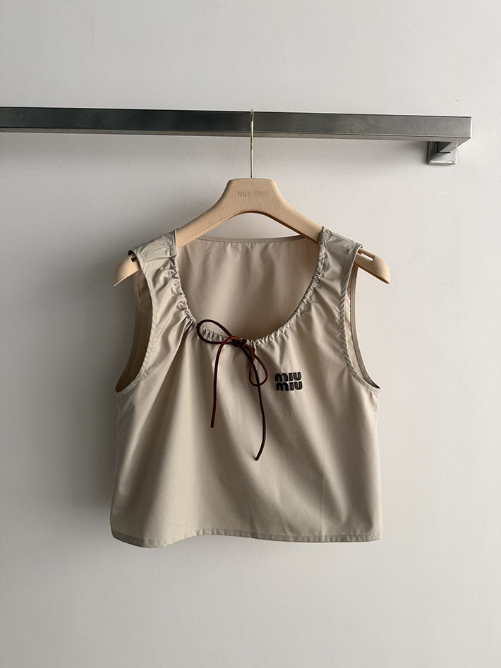 ミュウミュウ 服 レディース